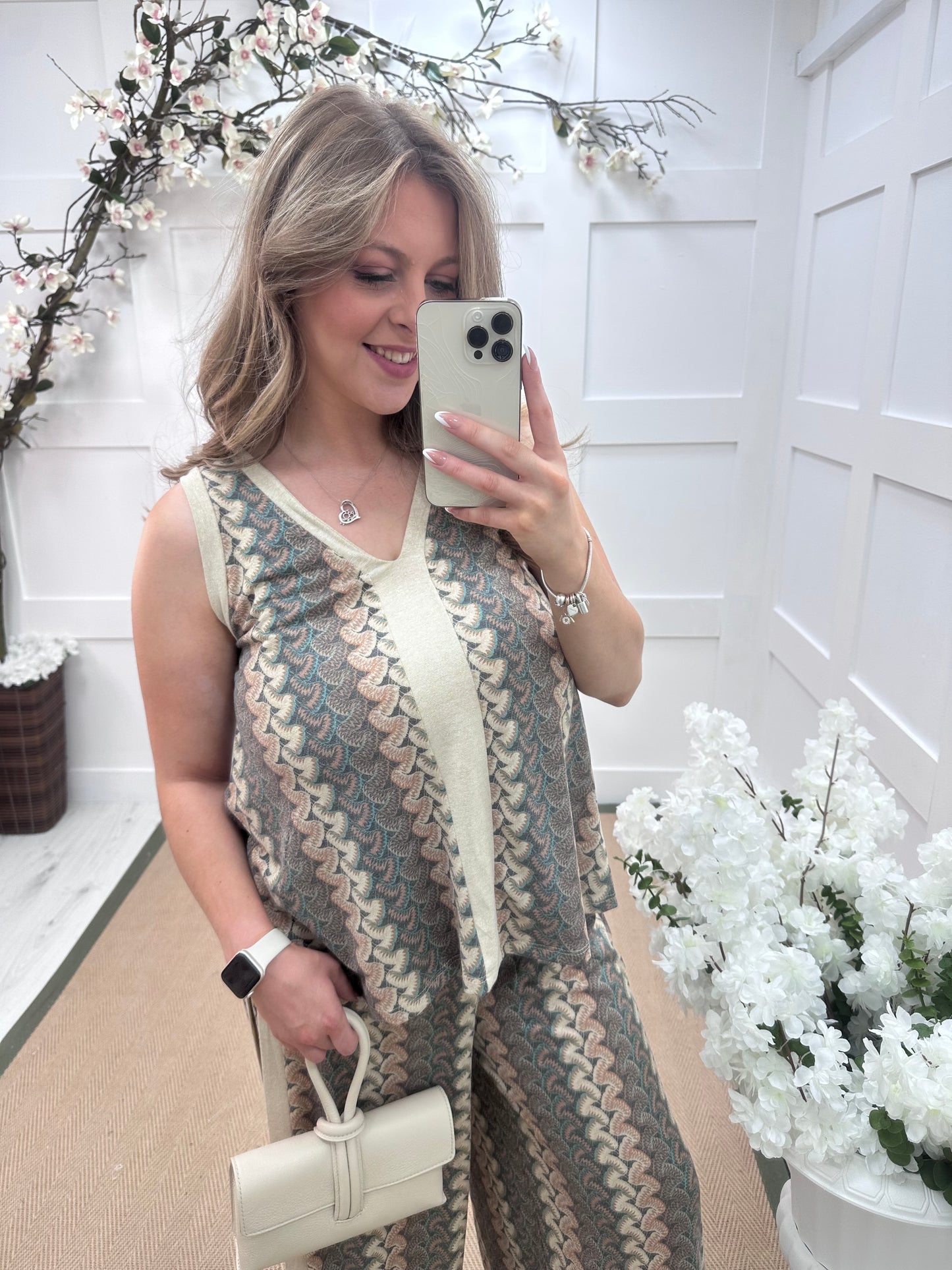 Pasha: Cream zigzag top & printed trouser co-ord set. One size: 12-18