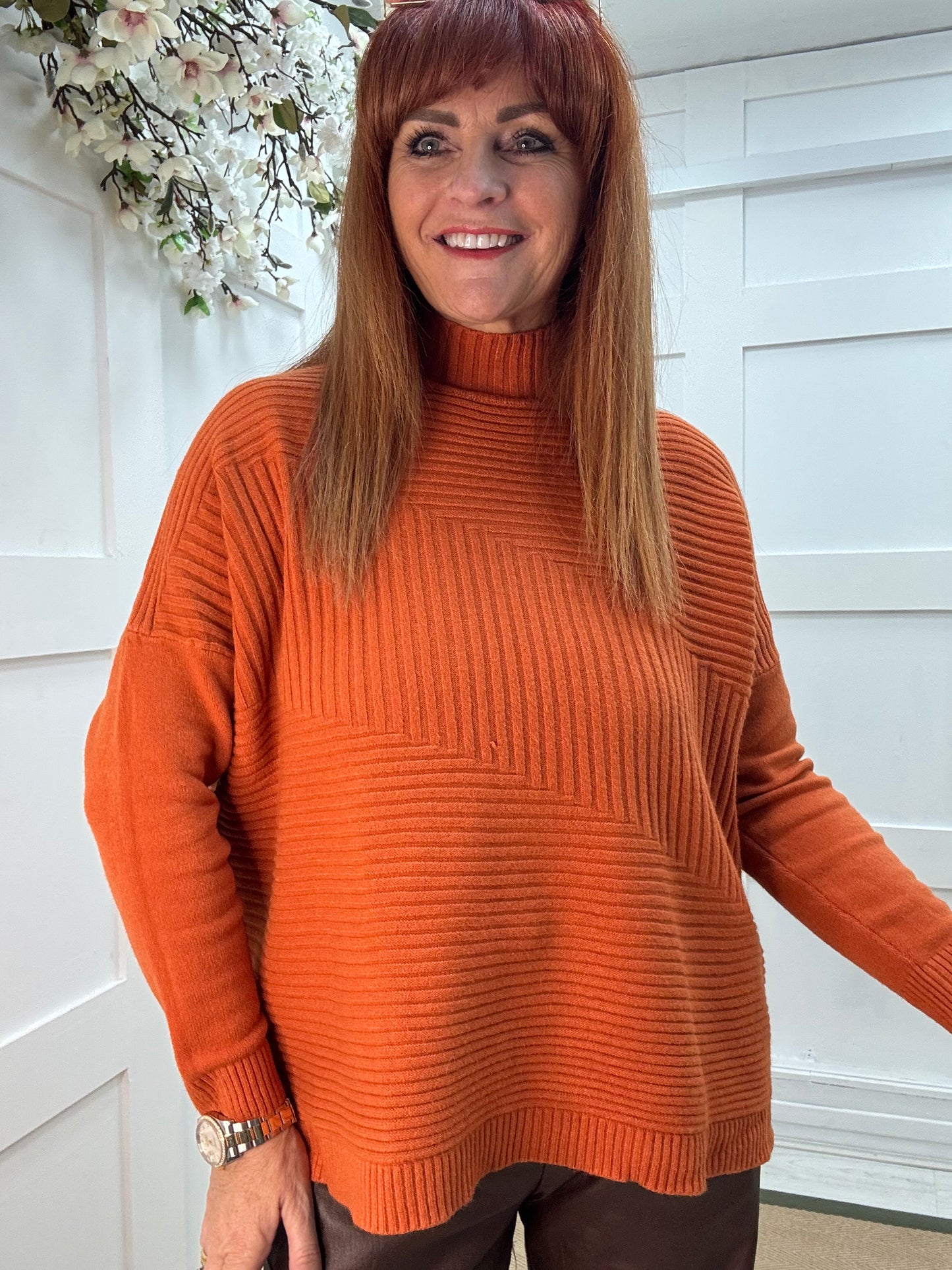 CJ: Orange high neck knitted top. One Sz: 12-18