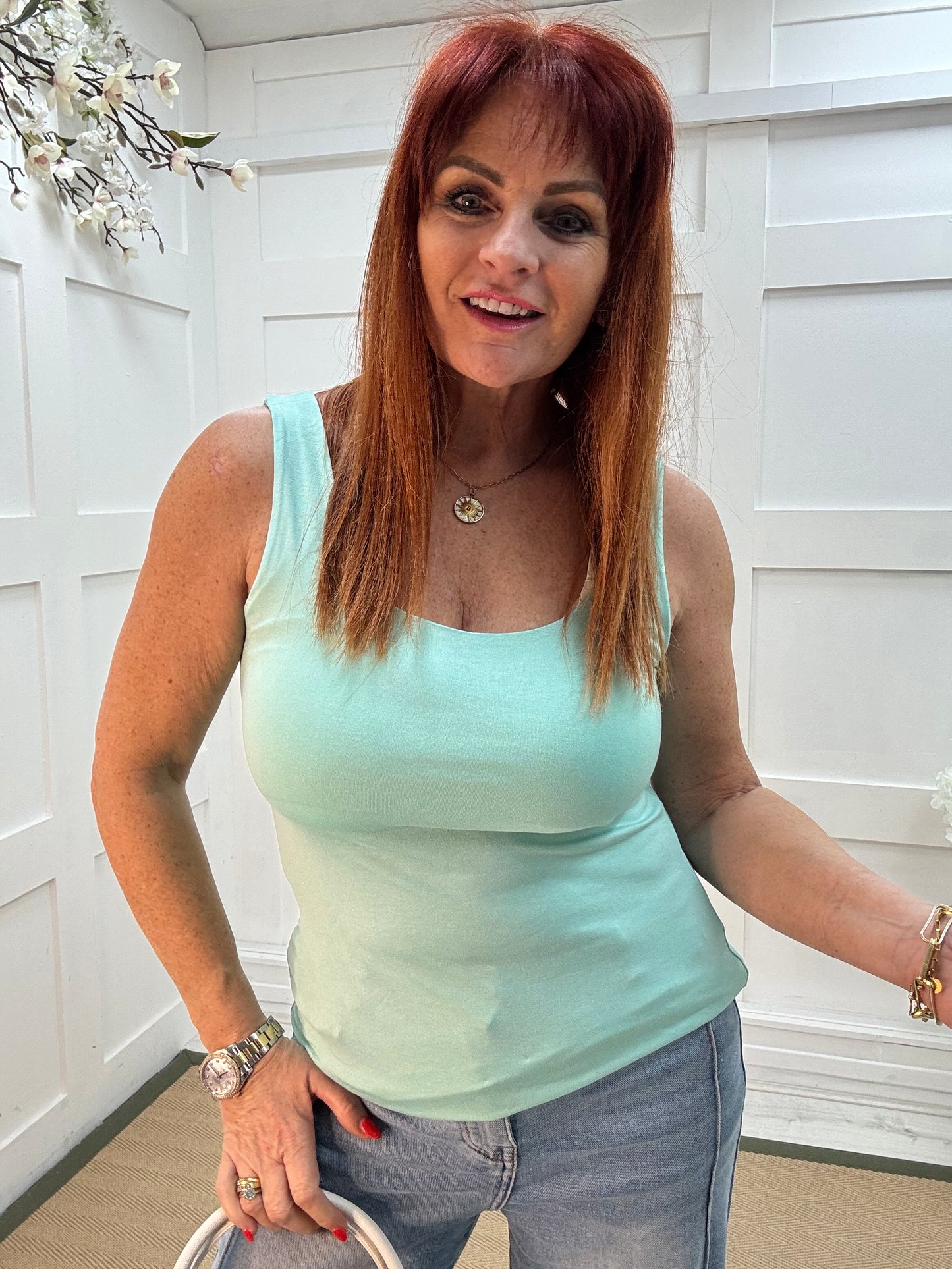 Abigail: Stretchy aqua basic vest top. 2 sizes