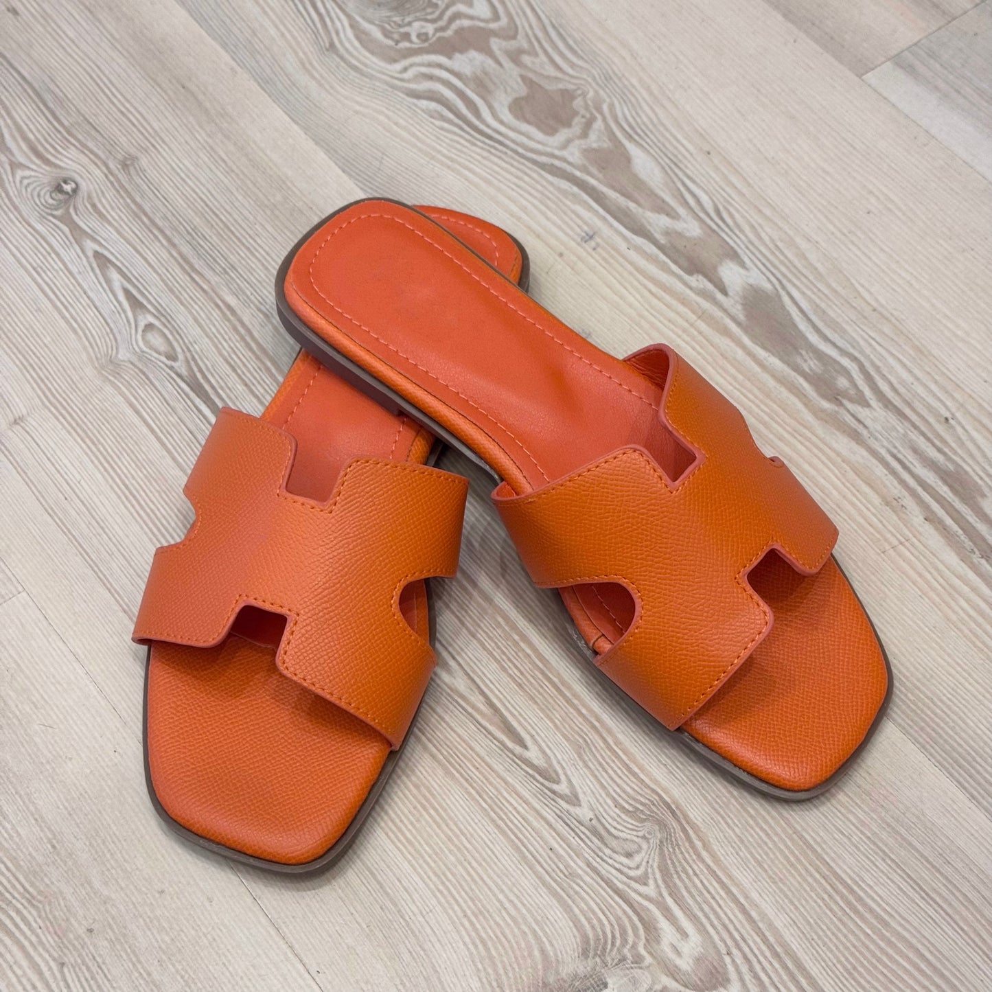 Heidi: Orange H style sliders. Sizes: 3-8