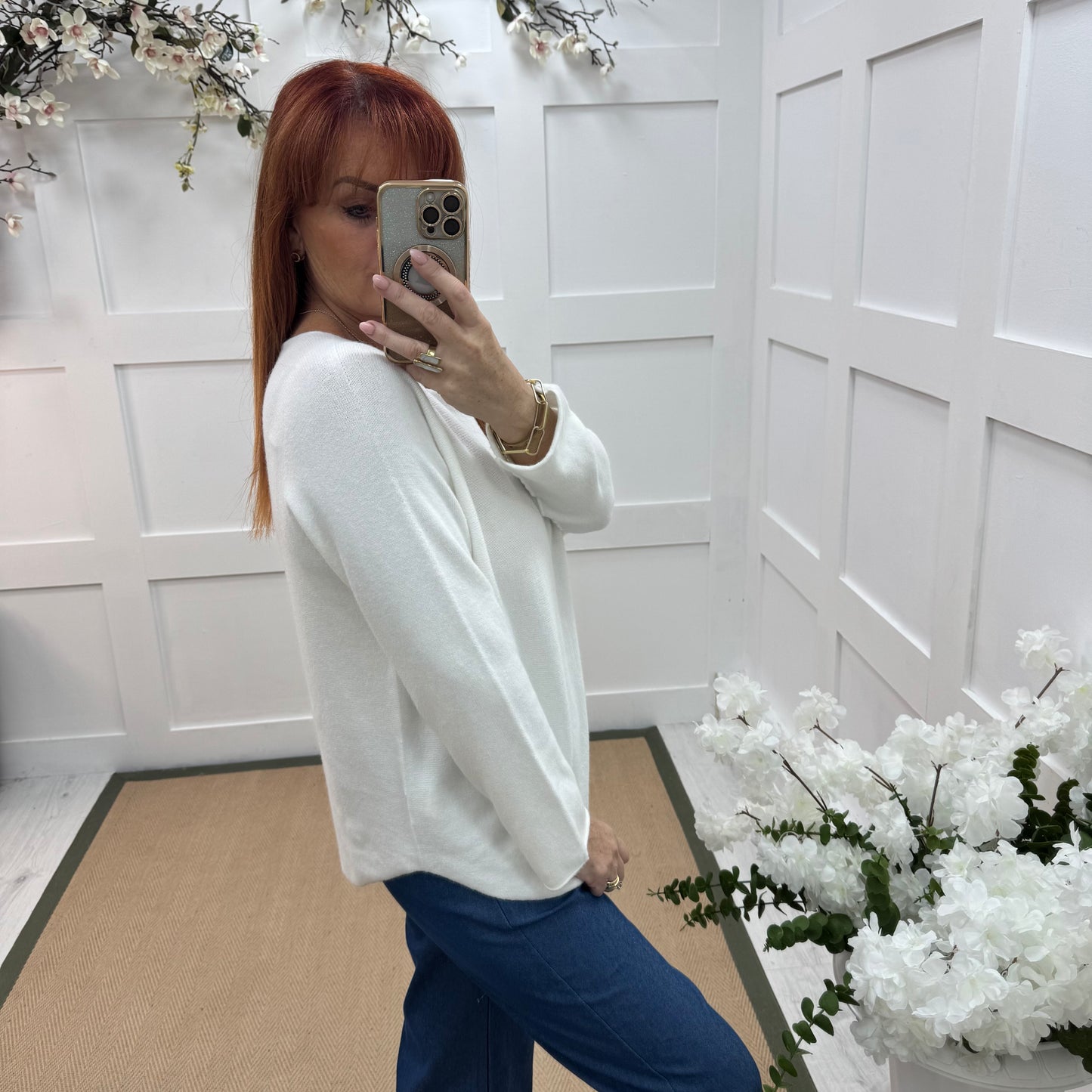 Mindy: White plain long sleeve knit top. One size: 10-16/18