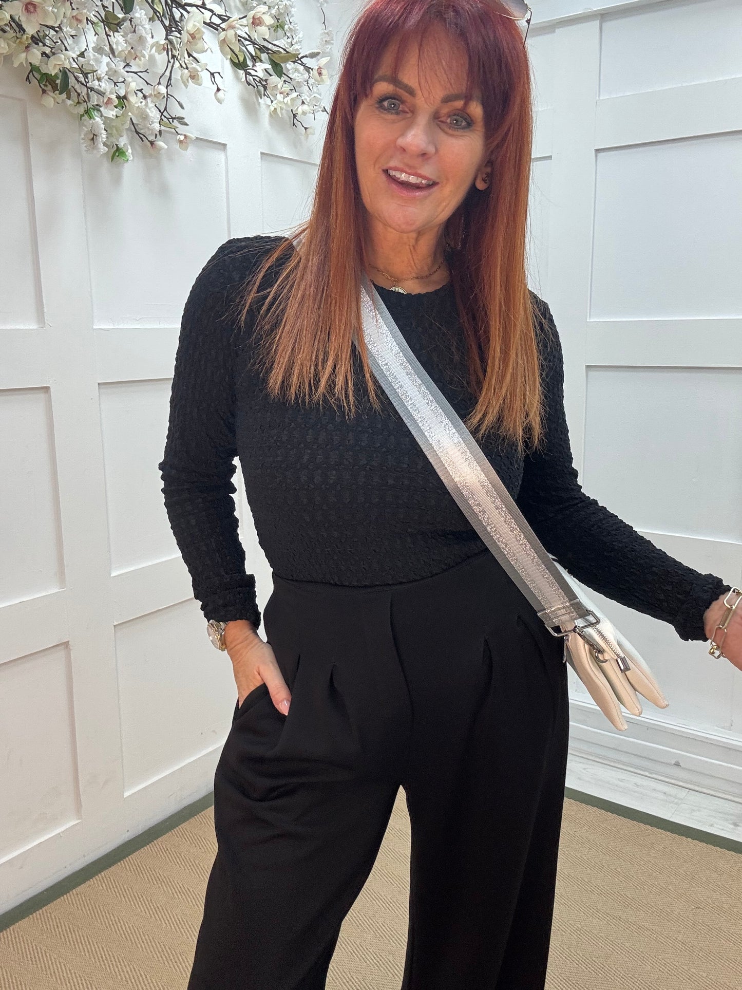 Tayla: Black high waisted pleated wide leg trousers. One size: 10-16