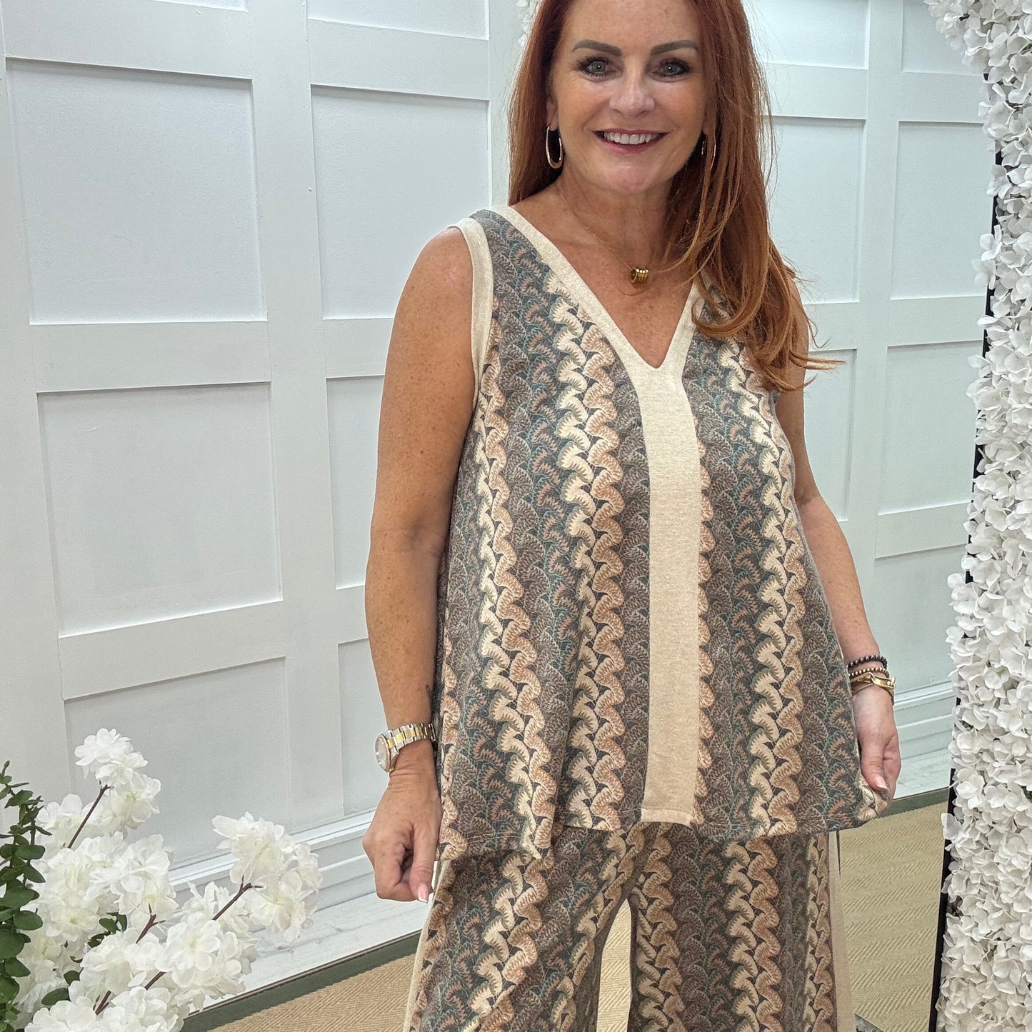 Pasha: Cream zigzag top & printed trouser co-ord set. One size: 12-18