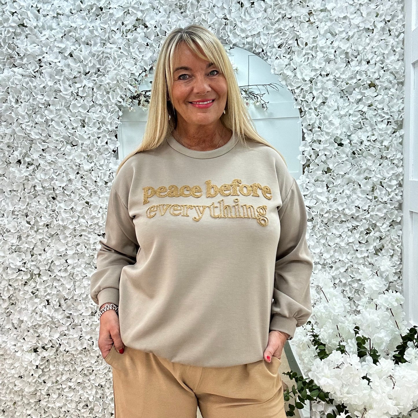 Prya: Mocha oversized Peace slogan sweatshirt. One size: 14-20