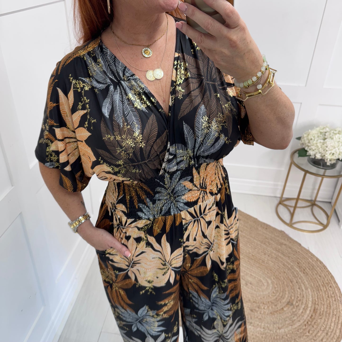 Maddie: Stretchy Black jumpsuit with pockets. One size: 12-20