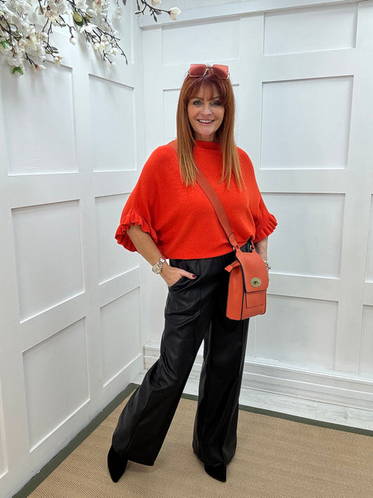 Sierra: Orange batwing fluted sleeve knitted top. One Size 12-18/20