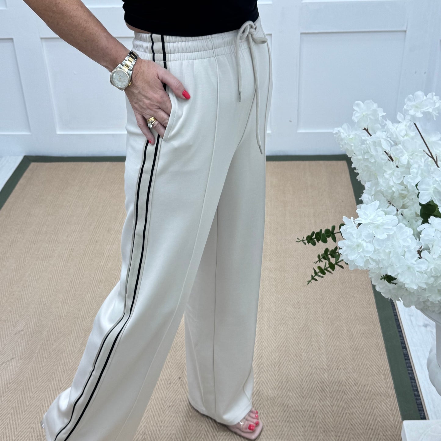 Roxi: Cream stretchy pocket sports trousers. 3 sizes