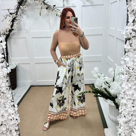 Romy: Nude sheer mesh top. One Sz: 12-18