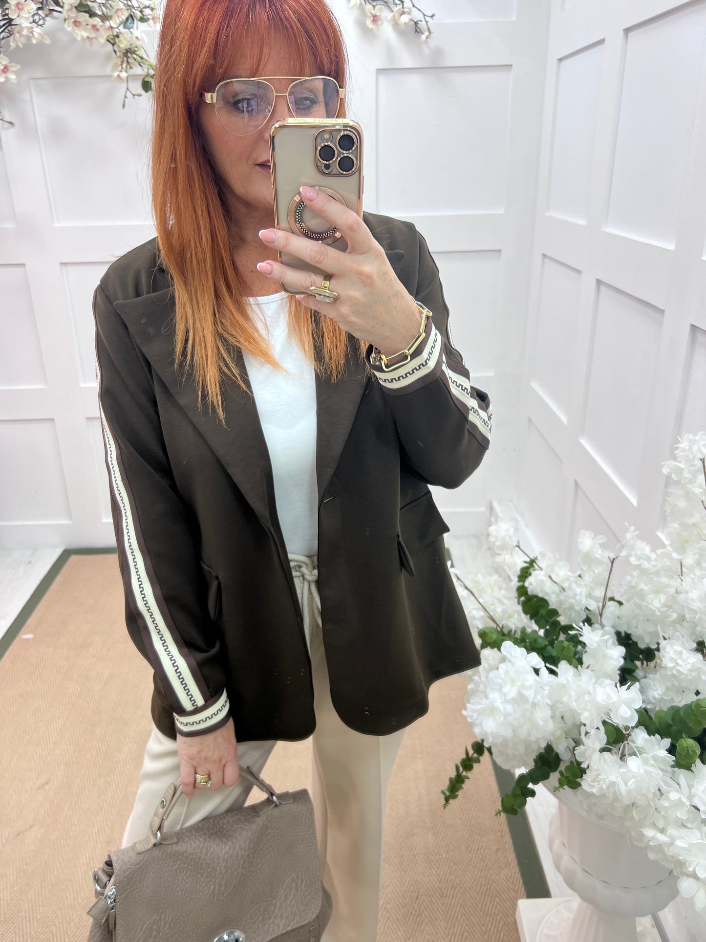Ines: Brown sports stripe sleeve blazer. One size: 12-16