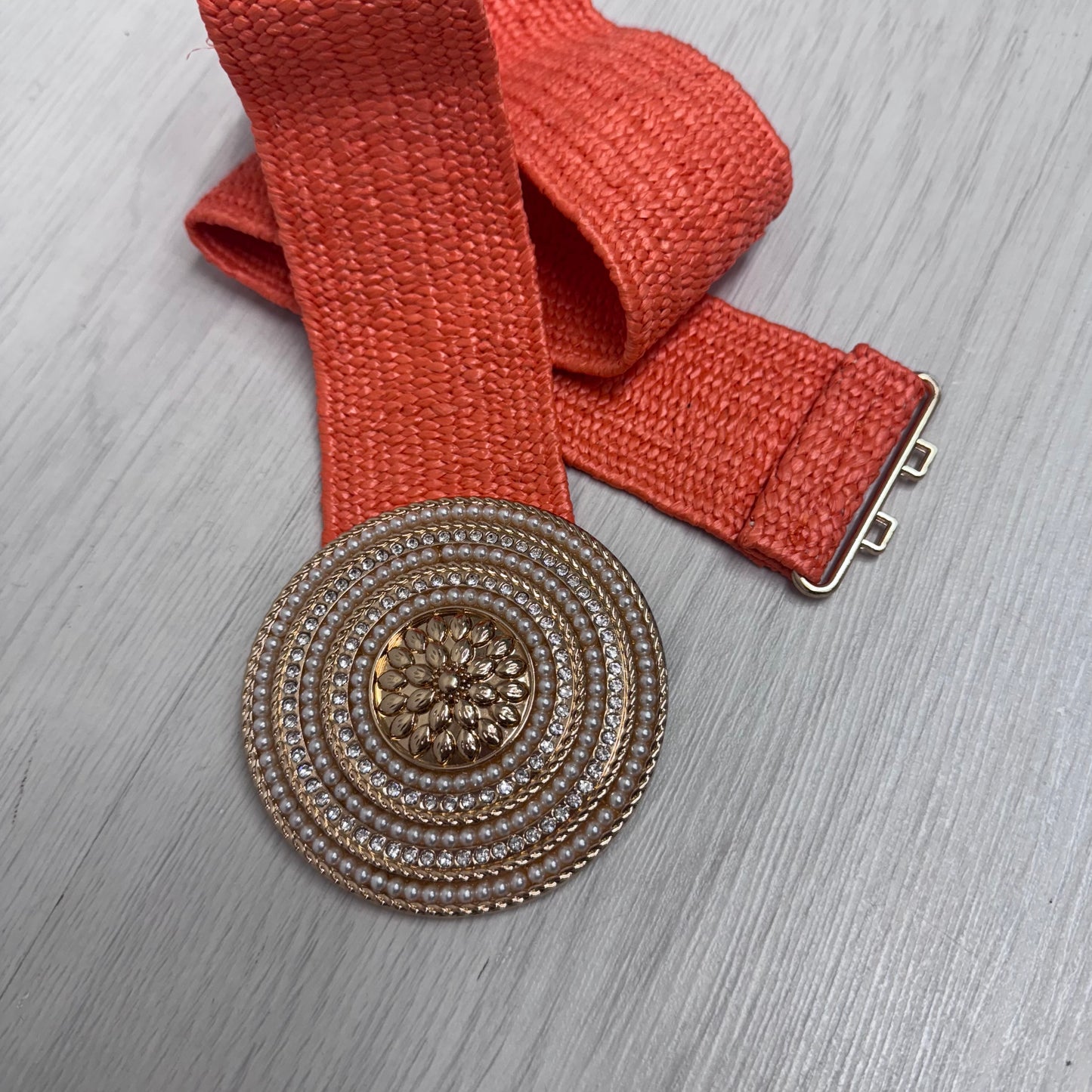 Perla: Orange round gold buckle wide belt. One size: 8-18
