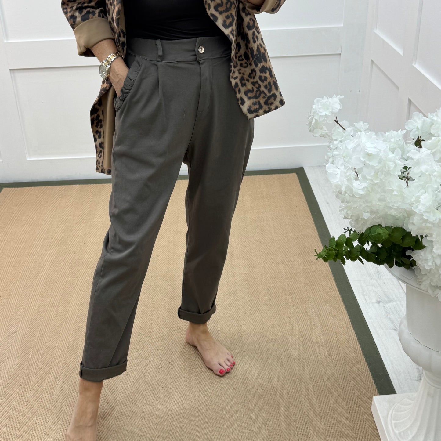 Mandi: Brown stretchy frill pocket magic trousers with rear pockets. One Size: 14-20