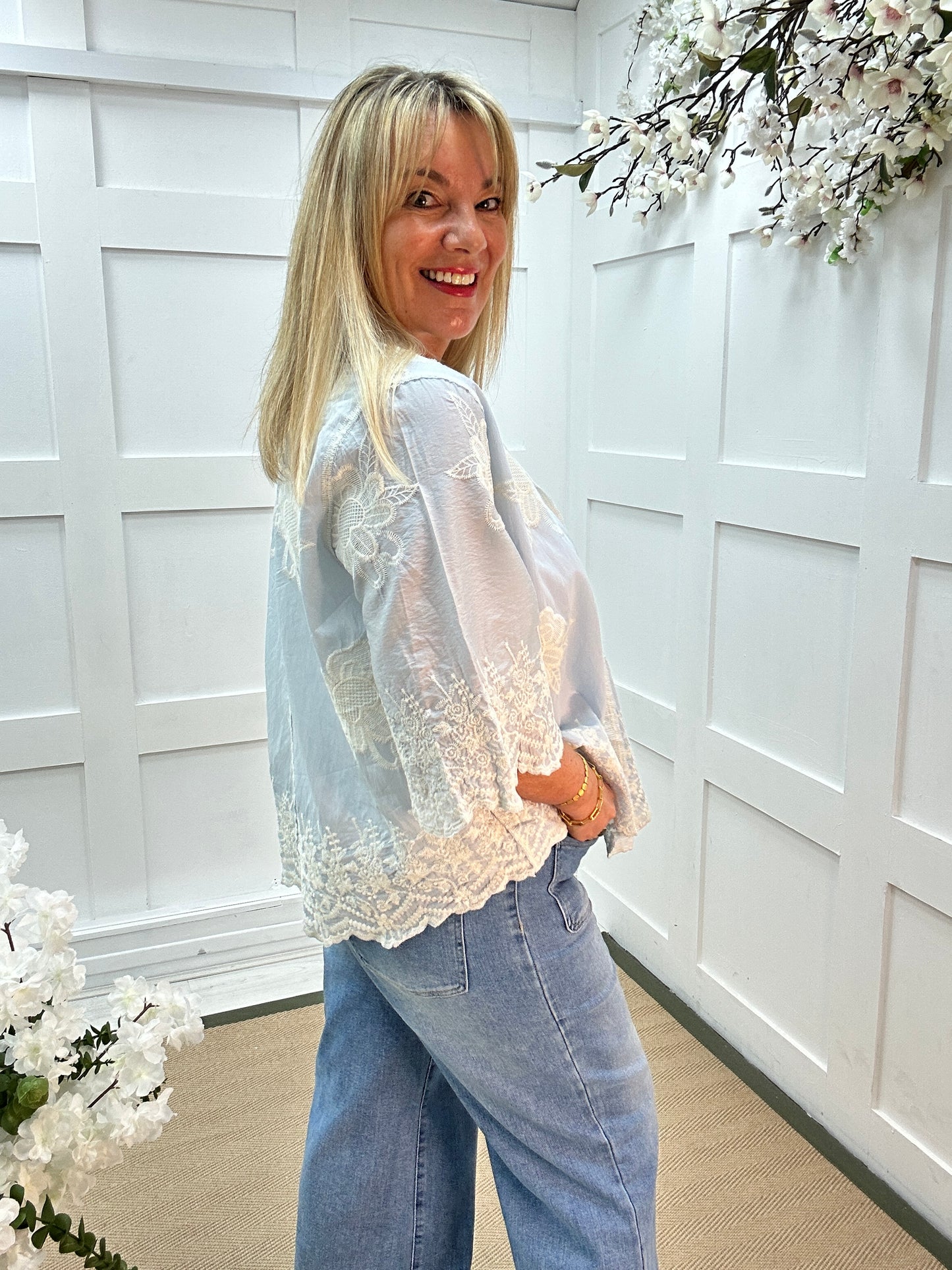 Emily: Blue floral embroidered shirt. One size: 14-20