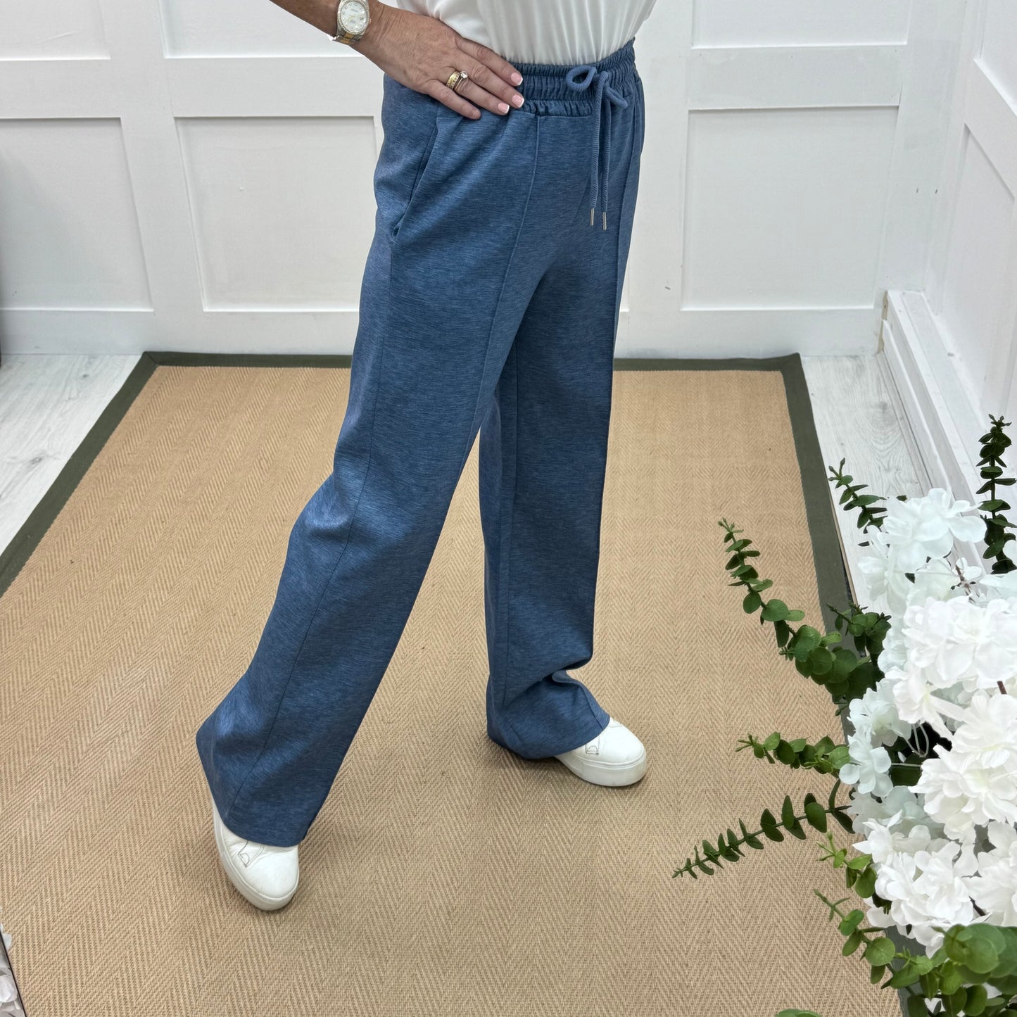 Trudy: Denim blue stretchy wide leg pocket trousers. 2 sizes