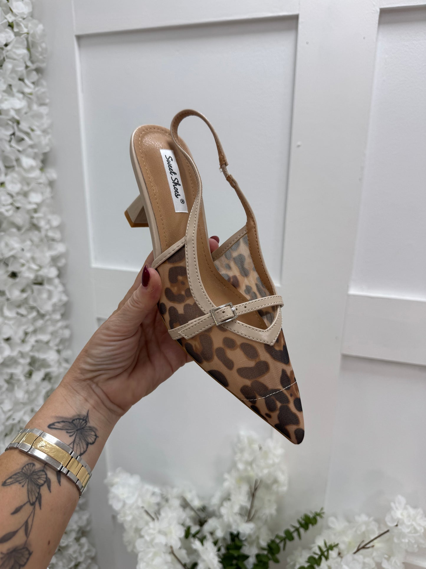 Zola: Leopard print kitten heel sling back shoes. Sizes: 3-8