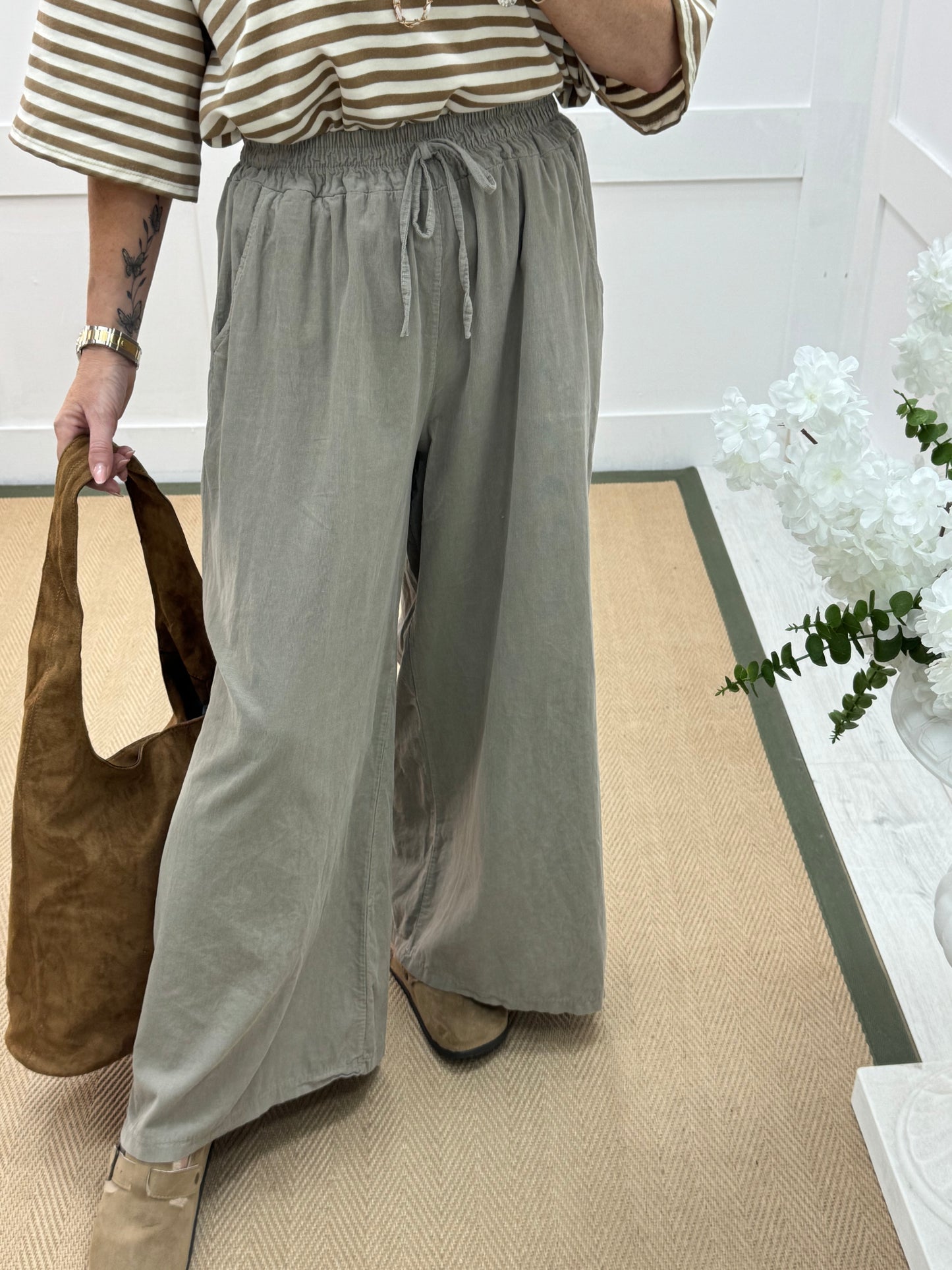 Lark: Stone needle cord wide trousers. One Size: 8-16