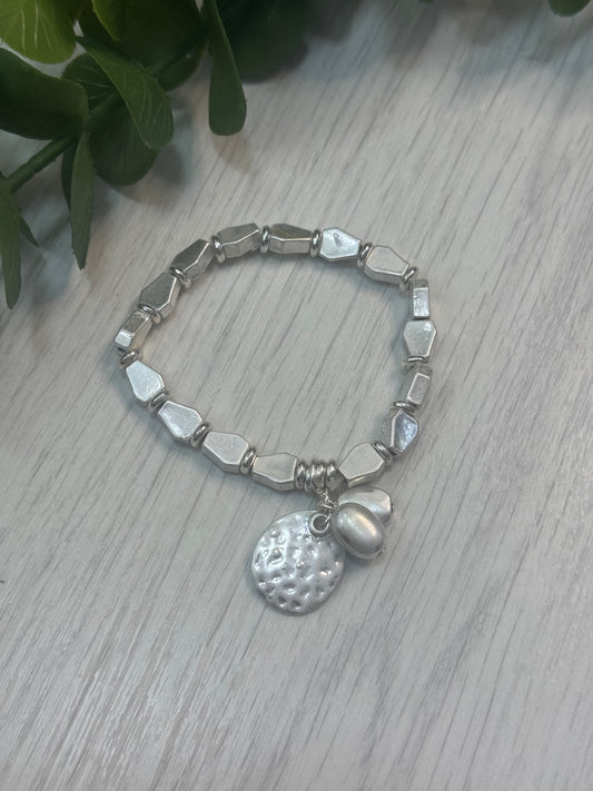 Shana: Silver metal charm bracelet
