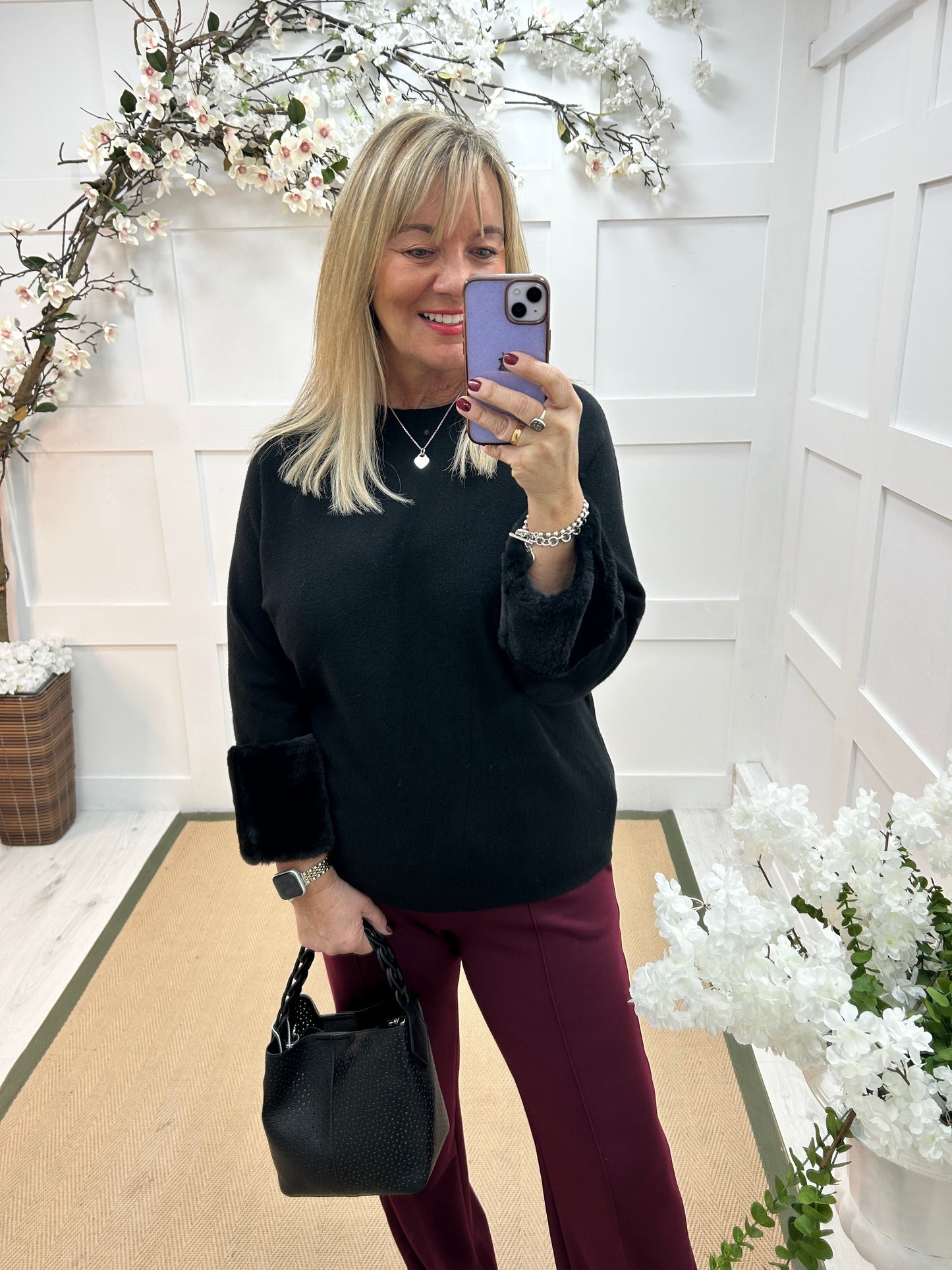 Coco: Black faux fur cuff knitted top. One size: 14-18