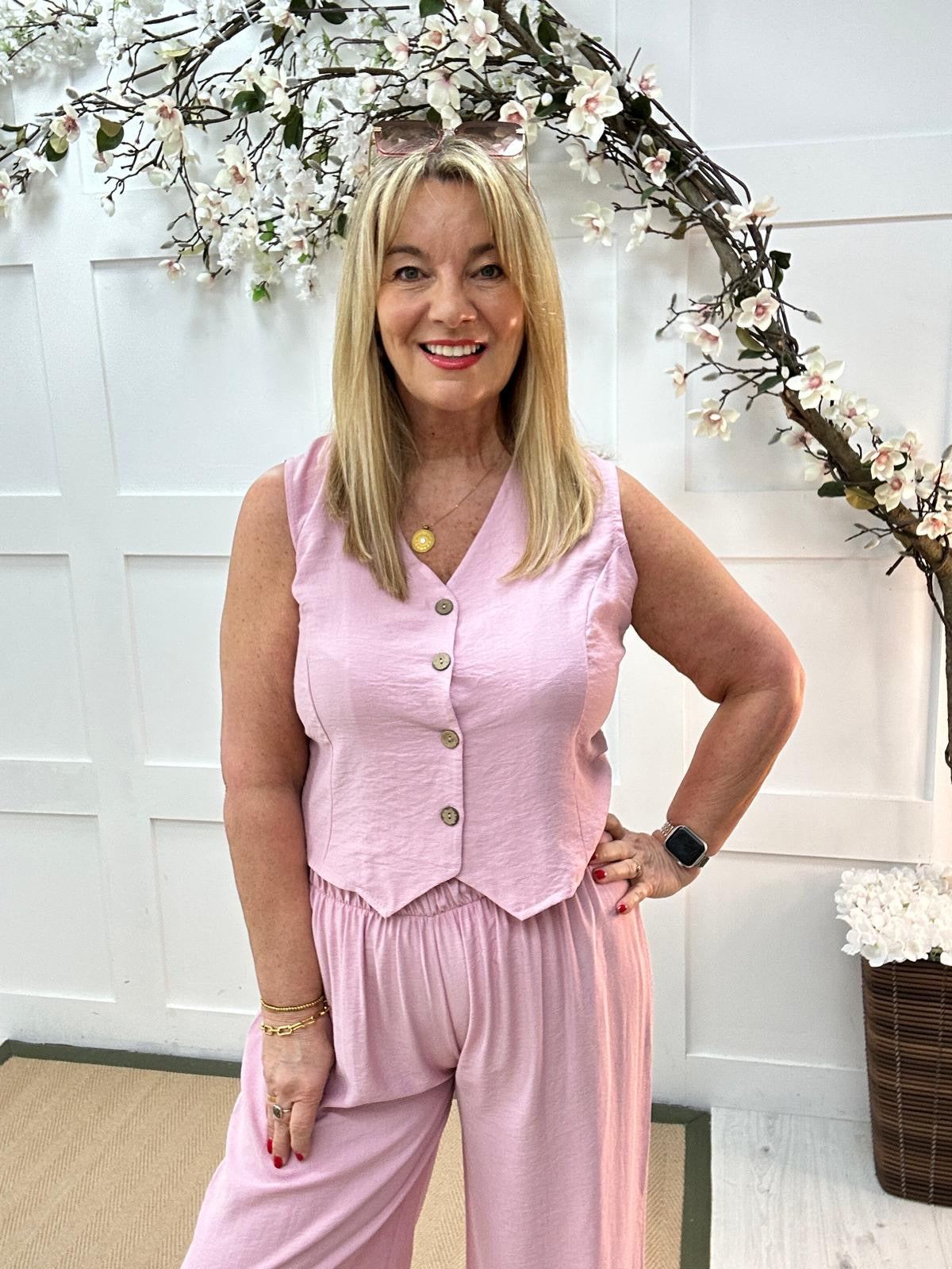 Cody: Pink waistcoat two piece trouser set. One size: 12-16