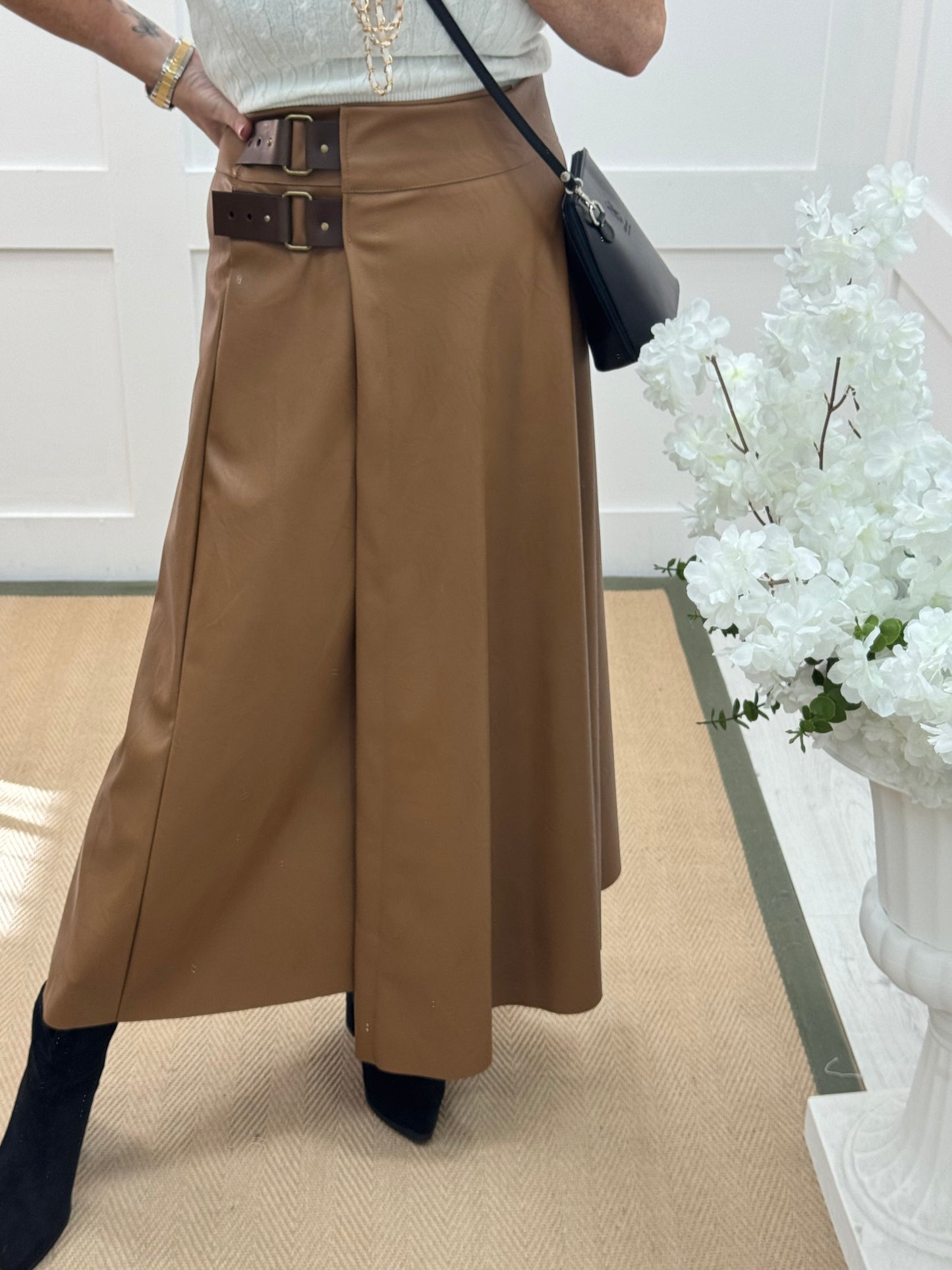 Raine: Tan faux leather belted asymmetric skirt. One size: 12-16