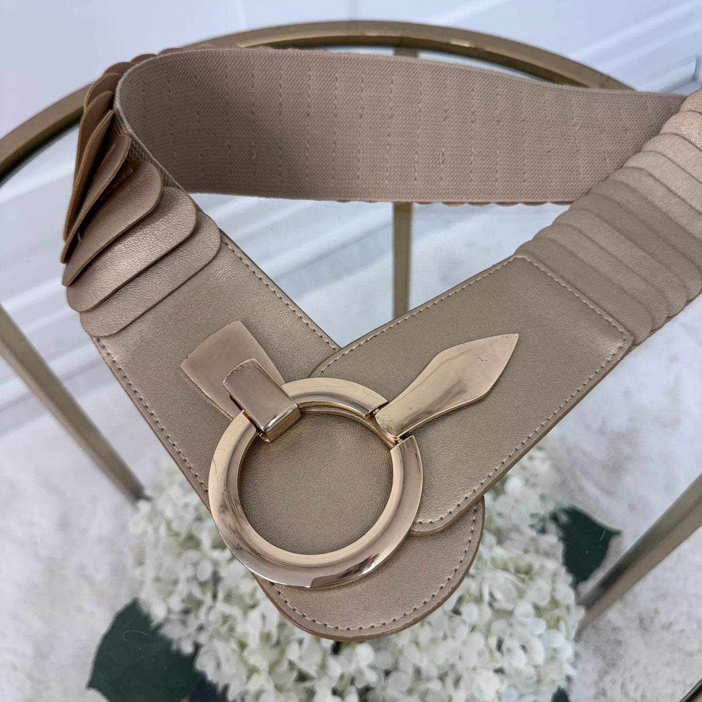 Rina: Stretchy belt with large buckle. One Size 10-18