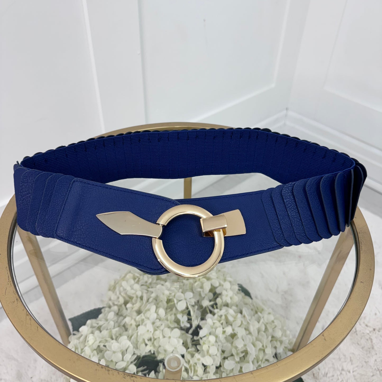 Rina: Stretchy belt with large buckle. One Size 10-18