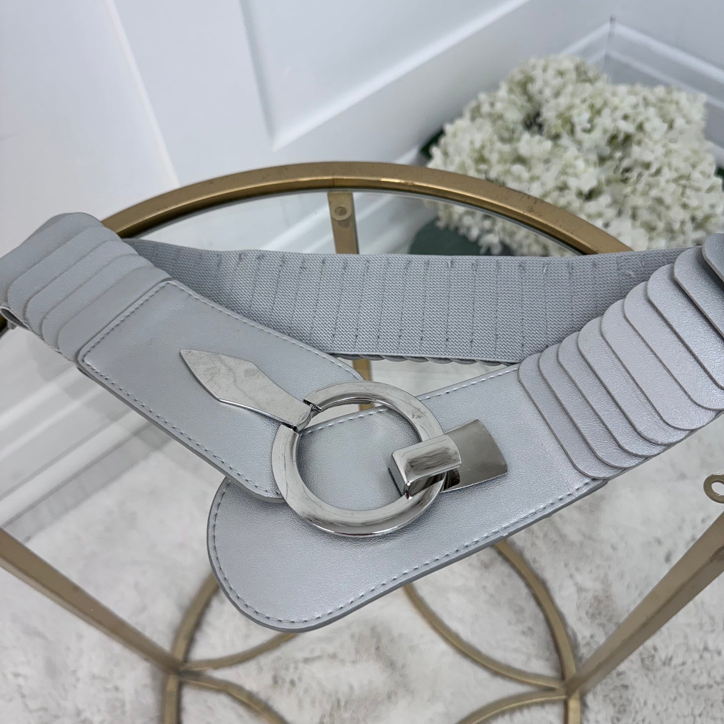 Rina: Stretchy belt with large buckle. One Size 10-18