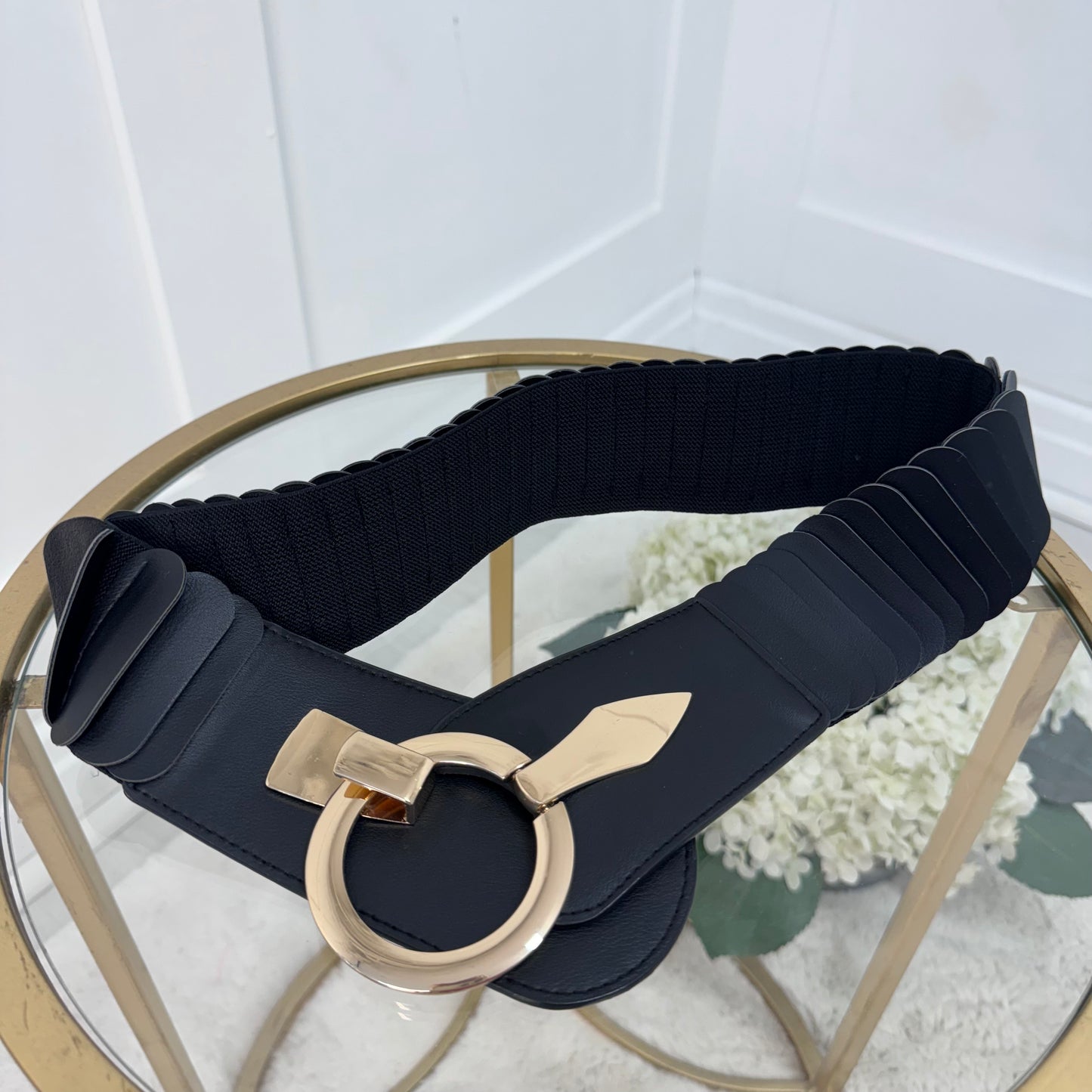 Rina: Stretchy belt with large buckle. One Size 10-18