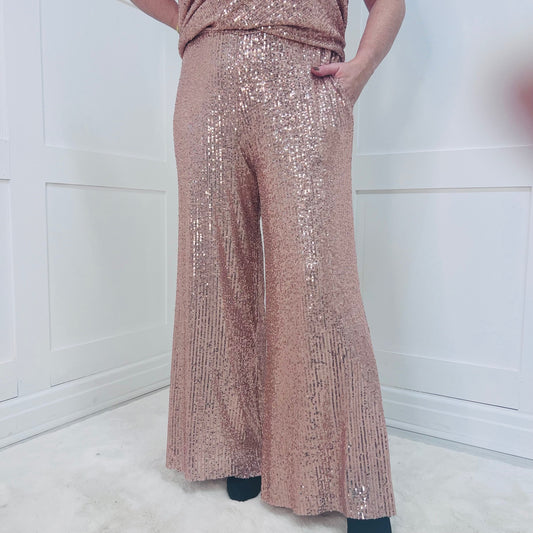 Truly: Fully lined sequin wide leg trousers. One size 12-18