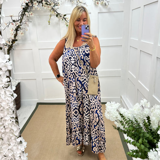 Kandi: Blue abstract print strappy maxi dress. One size 16-22