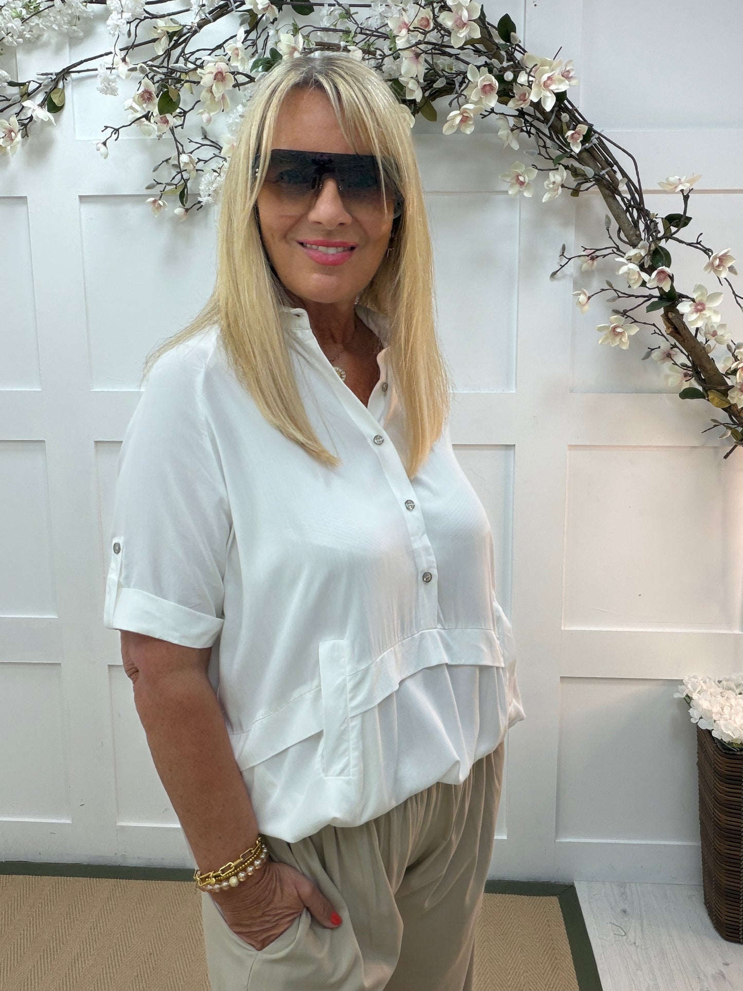 Sloane: 3/4 sleeve buttoned front elasticated waist top. One size: 14-20. 3 colours