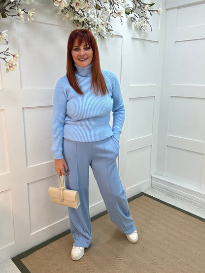 Trudy: Baby blue stretchy wide leg pocket trousers. One size: 10-16