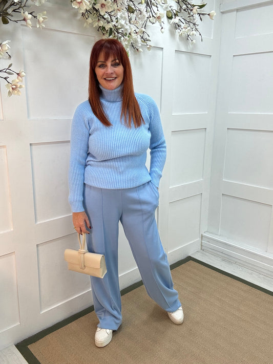 Trudy: Baby blue stretchy wide leg pocket trousers. One size: 10-16