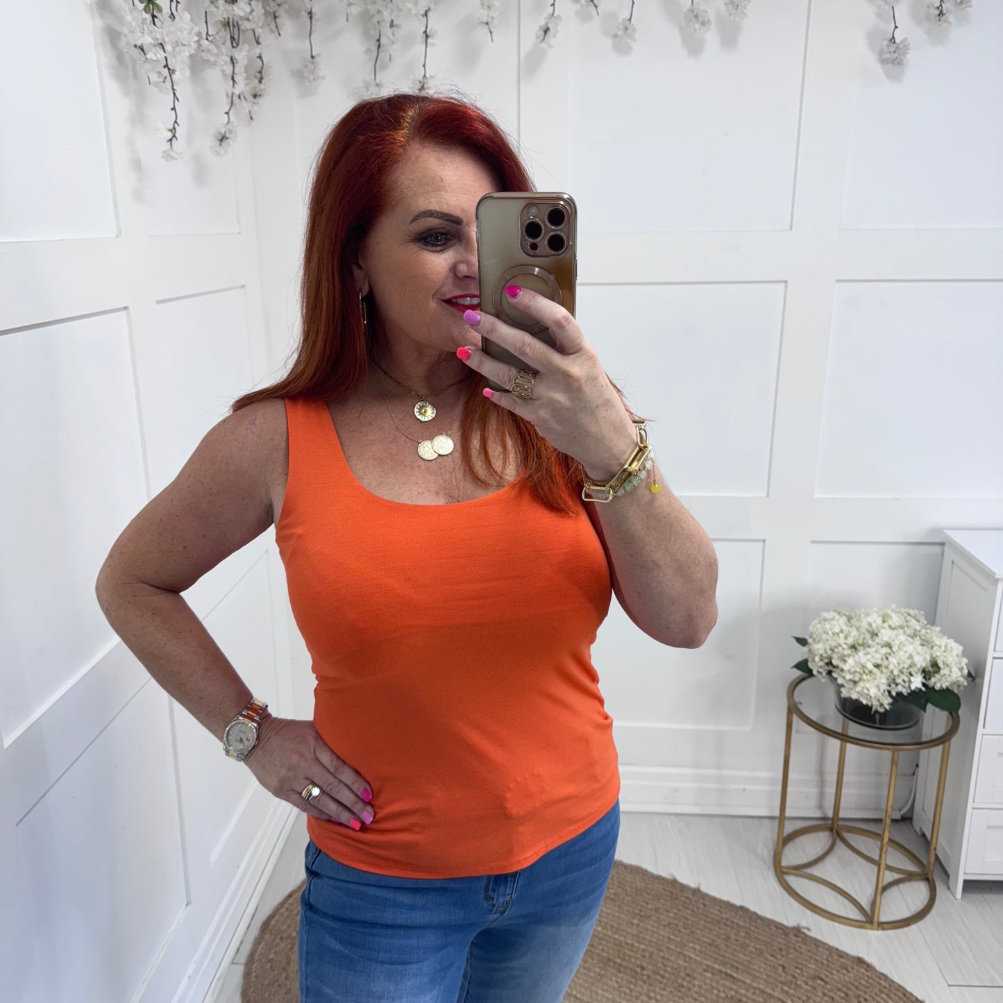 Abigail: Stretchy basic orange vest top. 2 sizes