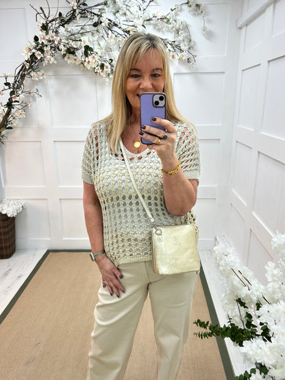 Maisy: Gold short sleeve V neck holey open knit top. One Sz: 12-16