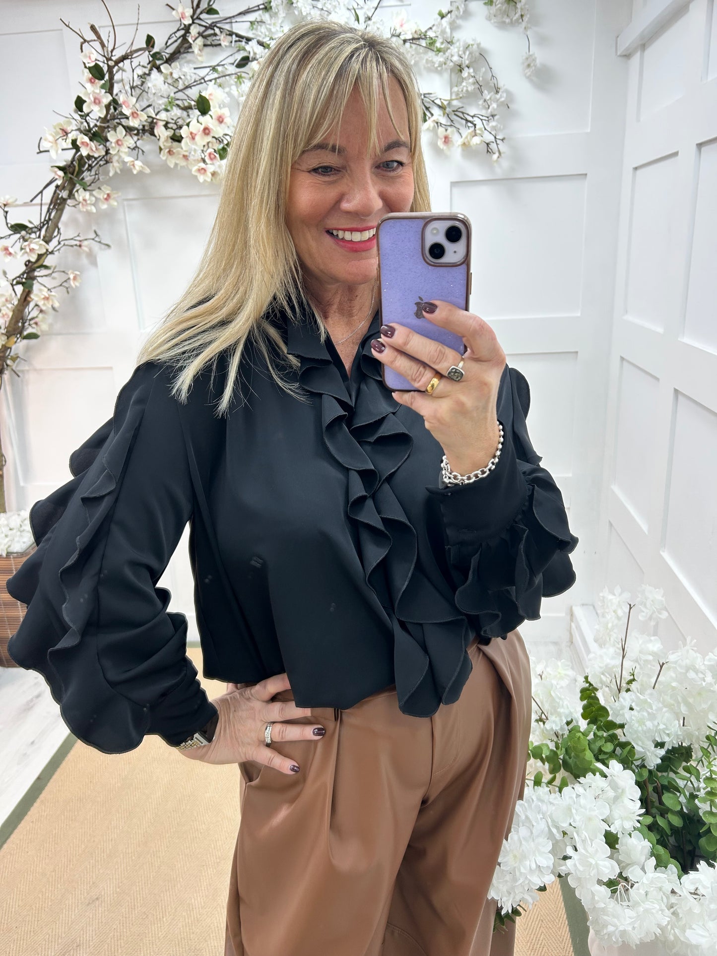 Riley: Black ruffle blouse. One size 14-20