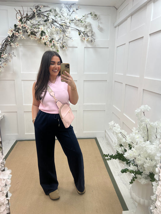 Tara: Pink V neck tank top. One size: 10-14