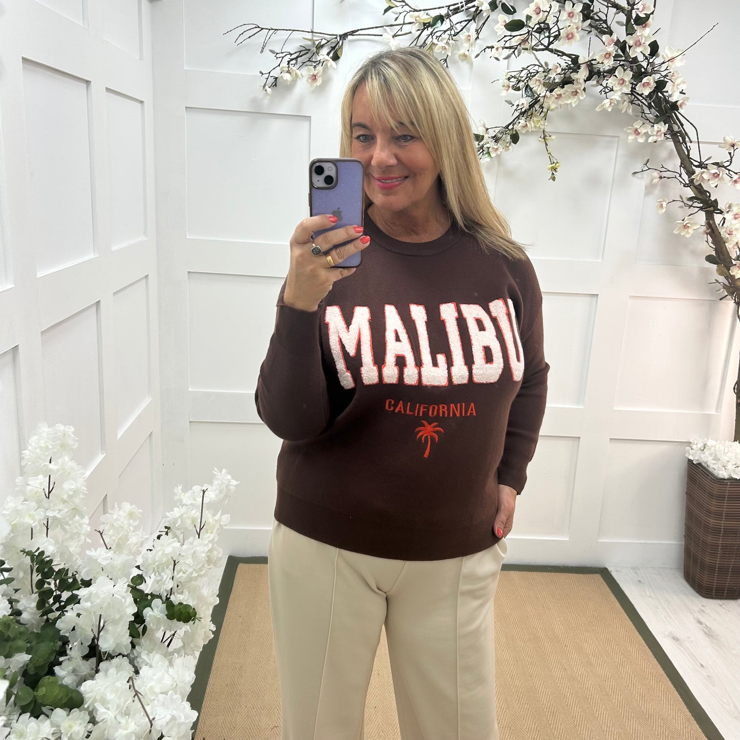 Melody: Brown textured MALIBU logo knitted top. One size 10-18