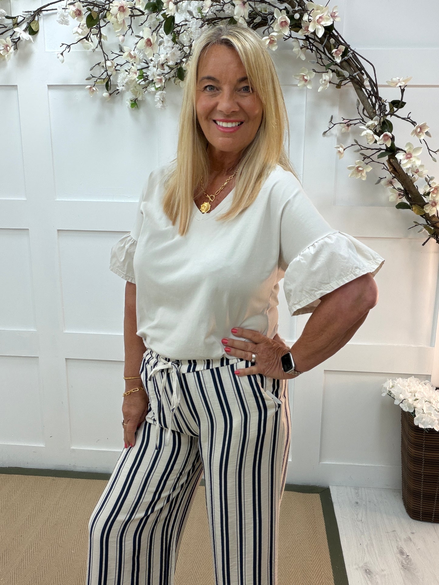 Riley: Ruffle short sleeve V neck top. One size 12-18. 4 colours