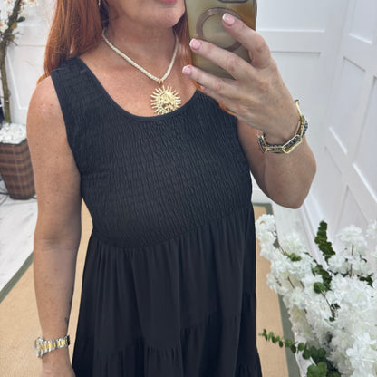Melody: Black shirred midi dress. One size: 12-18
