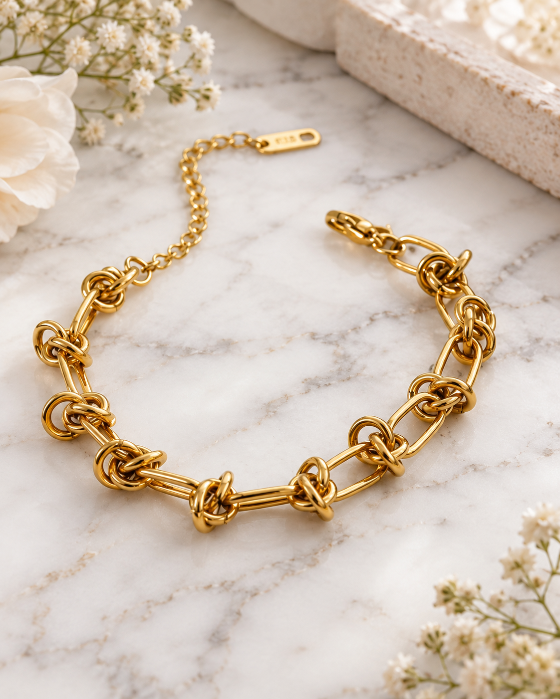 Darcey: 18K gold plated knot link bracelet
