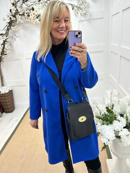 Camille: Blue trench coat . One size 10-16