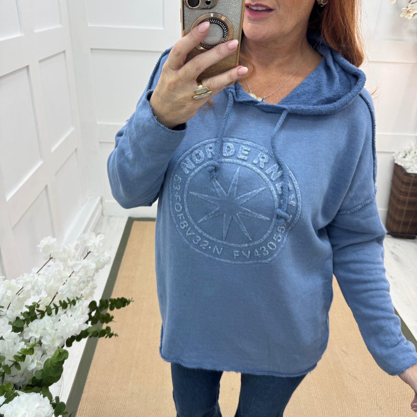 Sara: Blue hooded embossed compass top. One size: 12-18