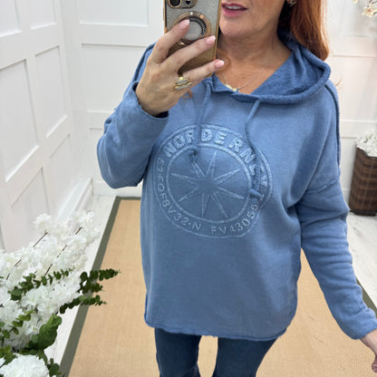 Sara: Blue hooded embossed compass top. One size: 12-18