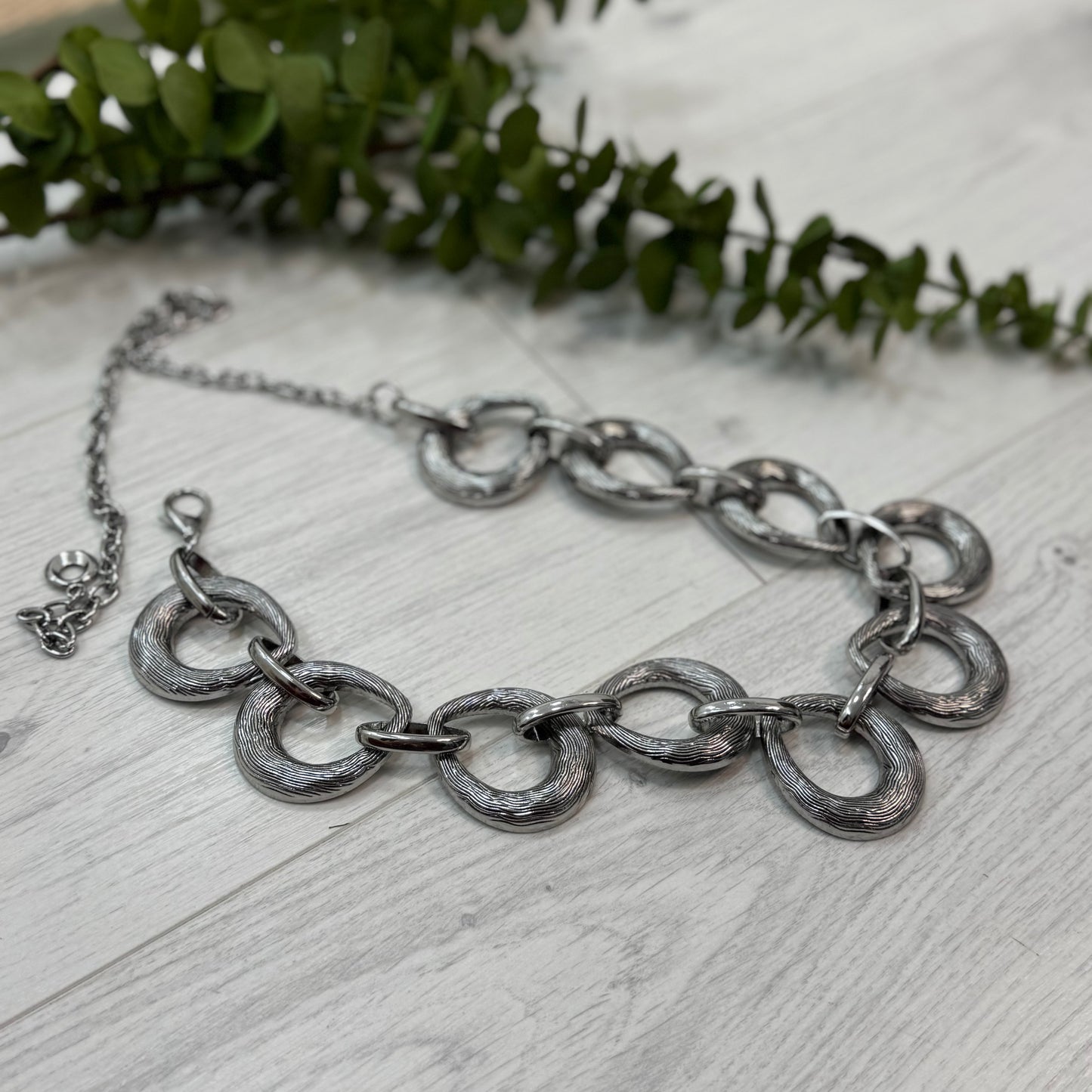 Fallon: Silver chain belt. One size: 8-18