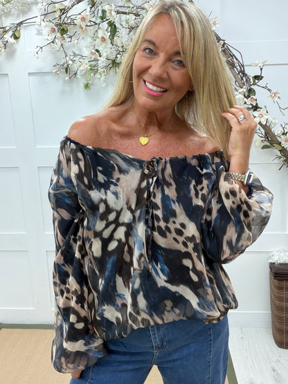 Farah: Blue animal print blouse. One size: 14-20