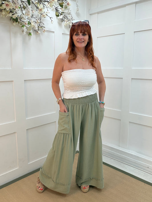 Candi: Khaki shirred waist wide leg pocket trousers. One size: 10-18