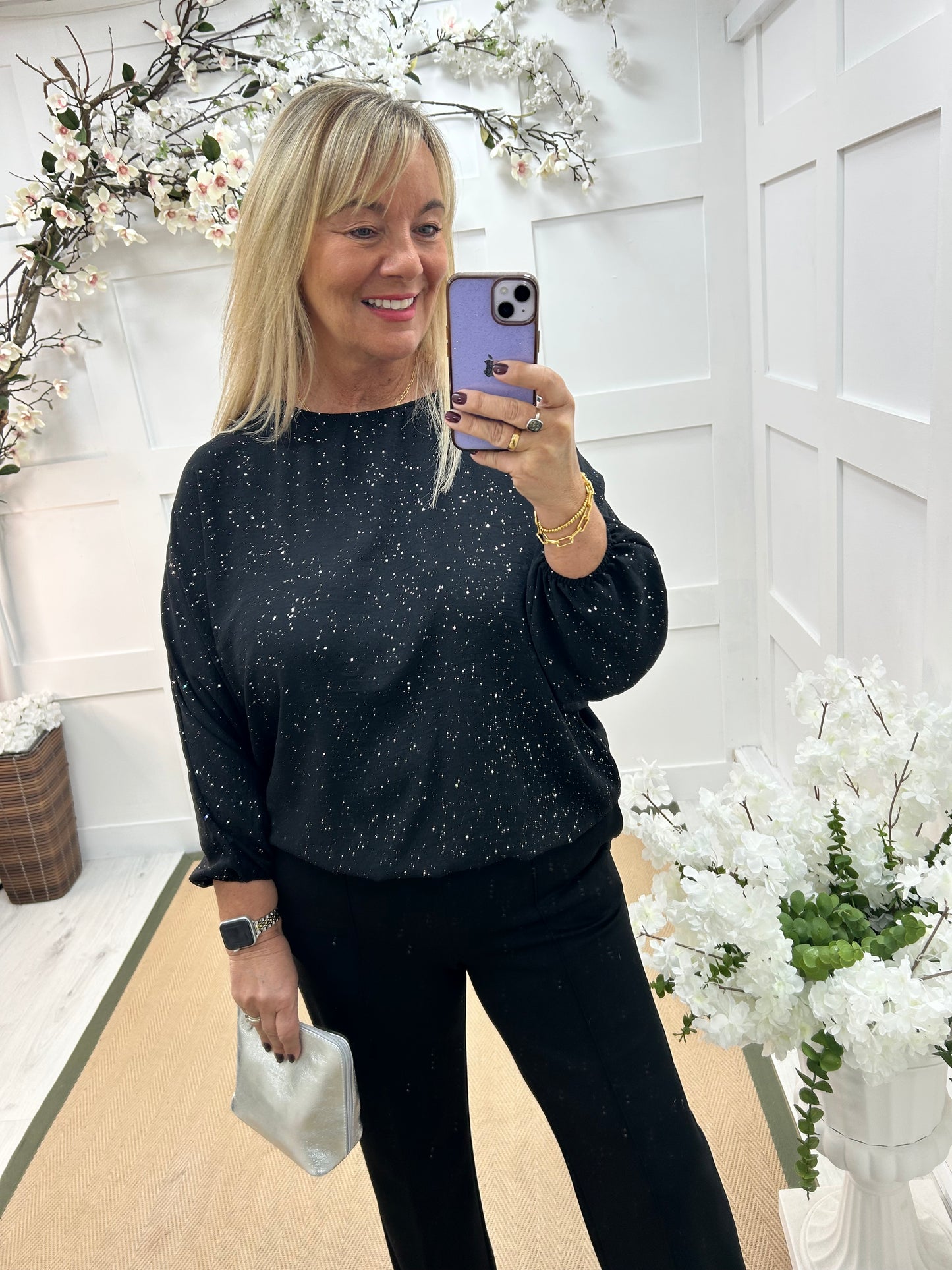 Aura: Black sparkle elastic hem top. One size: 14-18