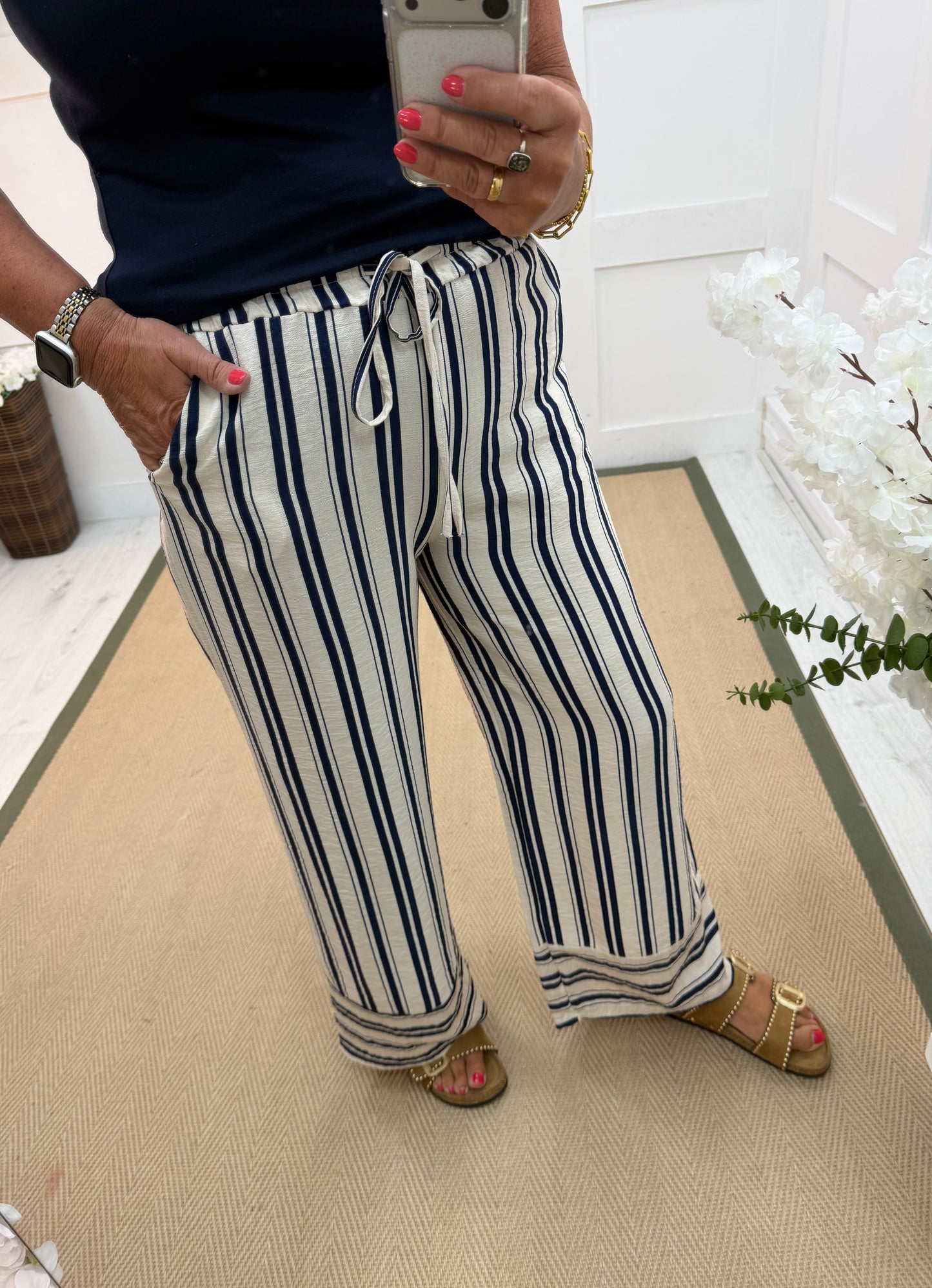 Stella: Cream & navy wide leg stripe trousers. One size: 10-16