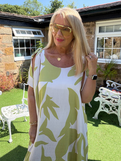 Mila: Leaf printed maxi dress with large rose gold disc detail. One size: 12-18. 2 colours