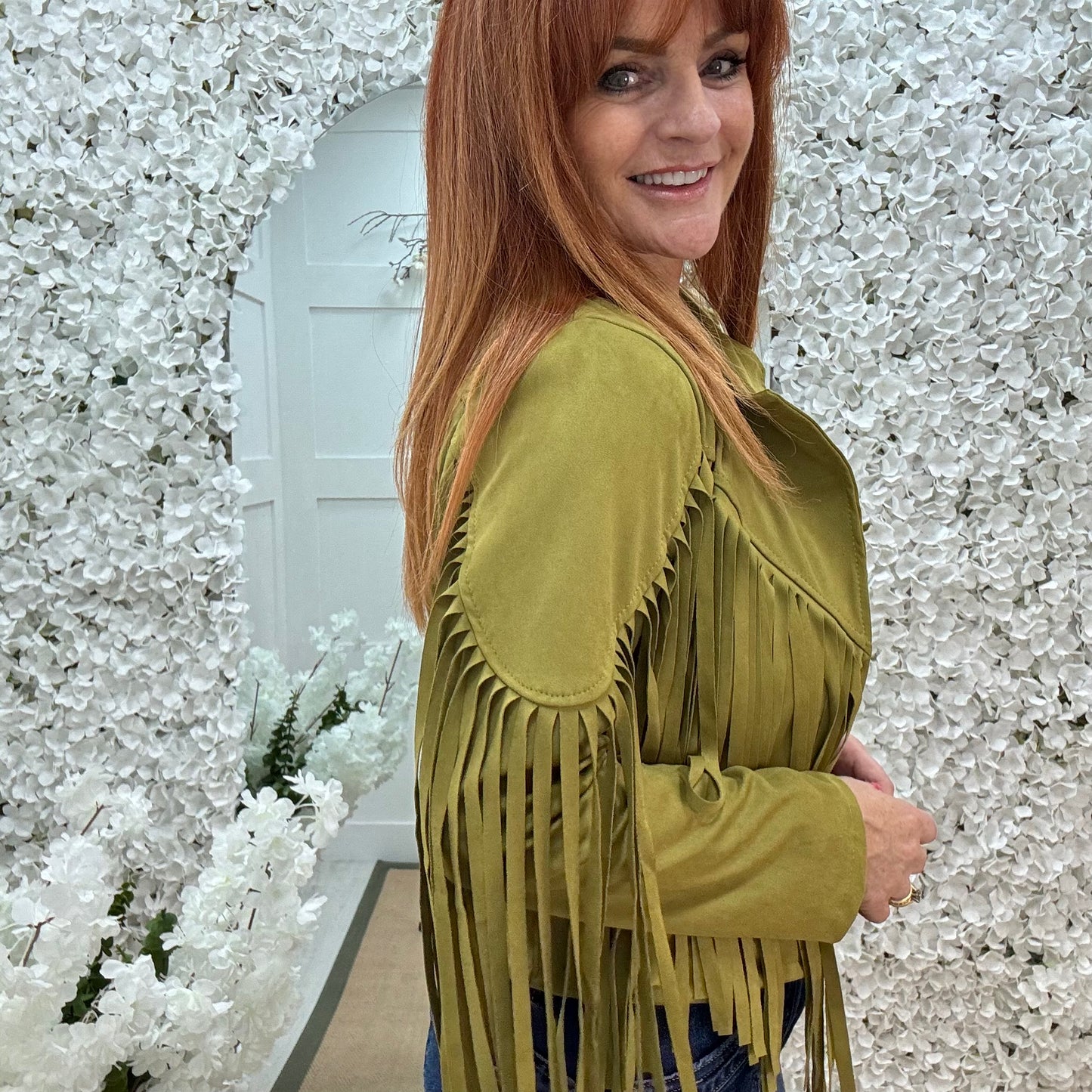 Heidi: Green short suede fringe jacket. One size: 8-14